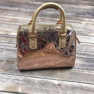 Michael kors metallic rose gold purse Clearance